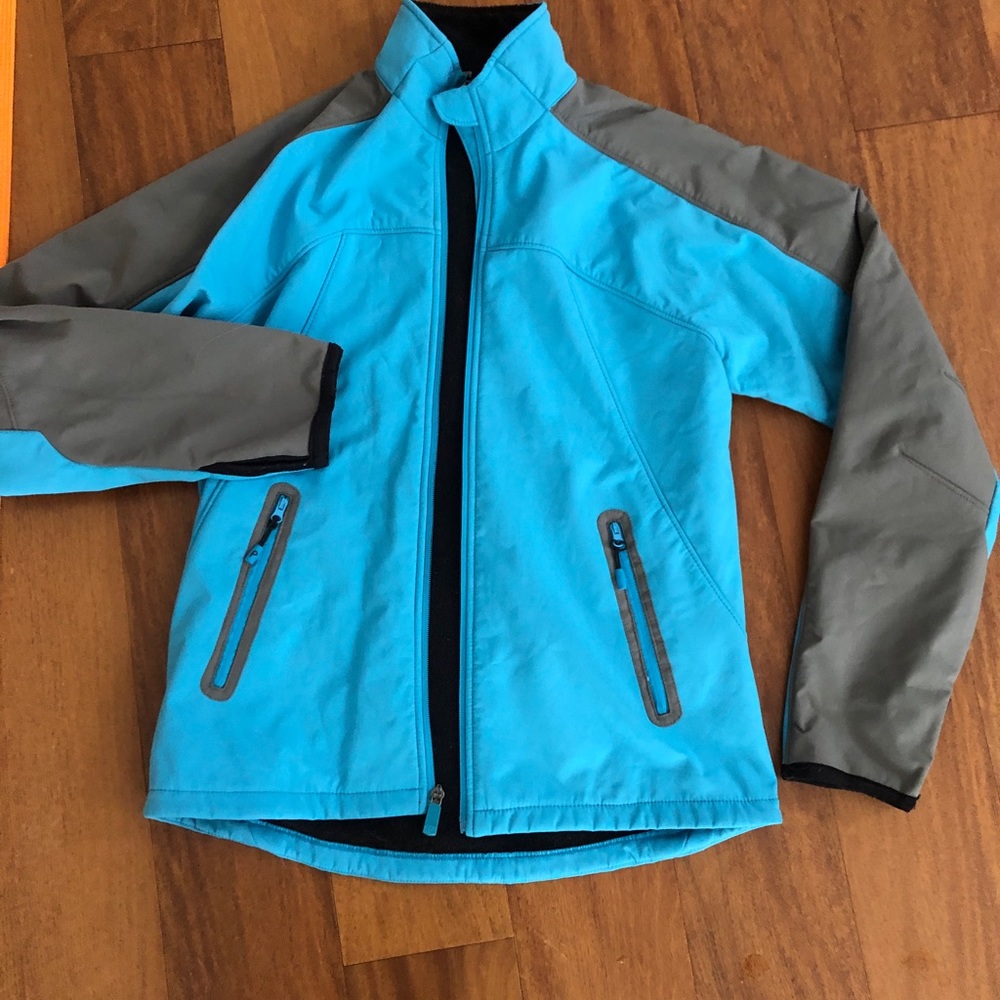 Predator soft shell jacket, full zip, fleece inside. Size medium. Like new.